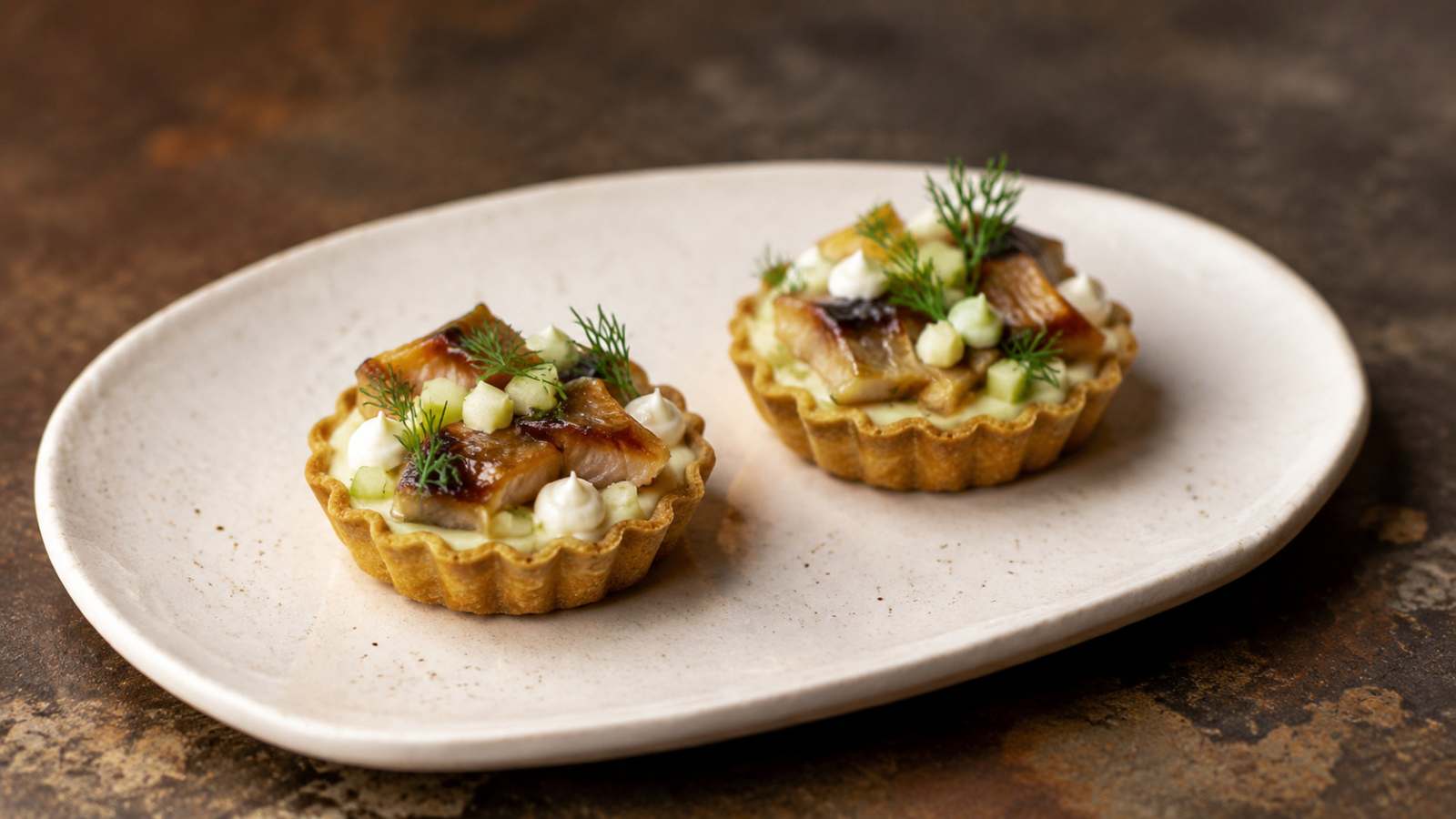Tartelette van knolselderij, appel en gerookte paling